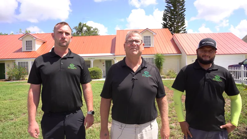 Michael Vecchione with two of his Roofs Only Florida team on a job site